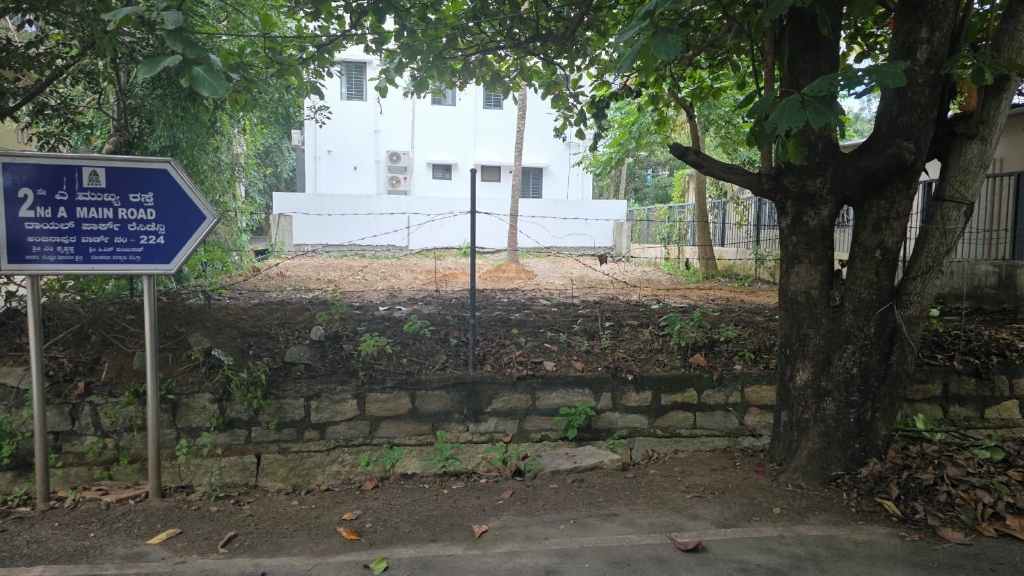 Cleared roadside plot with secure fencing